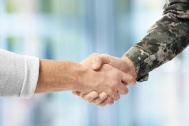 Civilian and military handshake